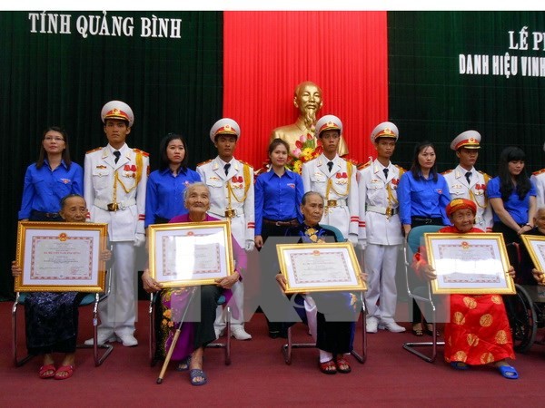 Outcomes of reviewing preferential policies for revolutionary contributors to be publicized in Sept - ảnh 1